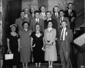 1954 UNA Employees pose for group photo with US President Kennedy