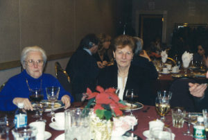 2005 UNA Christmas party two women eating